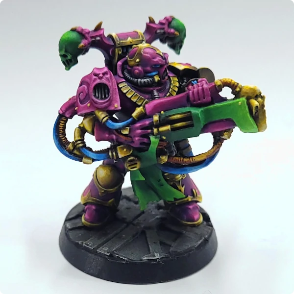 Emperor's Children Noise marines painted garish purple, green and bright yellow non metal metal gold.